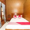 Отель Kampoeng Osing Syariah Guesthouse by OYO Rooms, фото 4