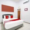 Отель OYO 91848 Kost As-salaam Syariah, фото 19