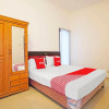 Отель OYO 91194 Manyar Residence Syariah, фото 3