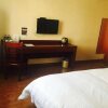 Отель GreenTree Alliance Nantong Qidong Chengdong Bus Station Renmin East Road Hotel, фото 3