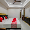 Отель OYO 18542 Petals Inn, фото 19