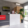Отель Formerly Reddoorz Plus Near Teras Kota 3, фото 2