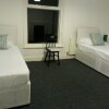 Отель Icon Harwich Apartment в Харидже