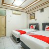 Отель OYO 2580 Hotel Puri Royan, фото 15