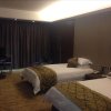 Отель Qinglong Hotel Yichun, фото 2
