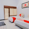 Отель OYO 421 Alianda Guest House Syariah, фото 7