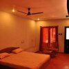 Отель 1 BHK Cottage in Sethumadai, Pollachi, by GuestHouser (B493), фото 17