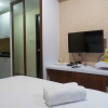 Отель Compact Studio Room at Tamansari Papilio Apartment, фото 6