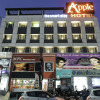 Отель Capital O 4493 Apple Hotel, фото 1
