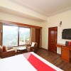 Отель OYO 13608 Home Grand View Suite Shoghi, фото 6