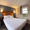 Отель Moonlight Inn and Suites, фото 14