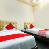 Отель OYO 12856 Beach City, фото 3