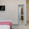 Отель OYO 92233 Srikandi Homestay Syariah, фото 7
