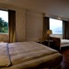 Отель Spa Home Sun Moon Lake Luxury Lakeside Hotel, фото 3