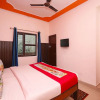 Отель OYO 10875 Optimum i Hotel, фото 2
