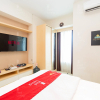 Отель RedLiving Apartemen Grand Kamala Lagoon - Icha Rooms Tower Barclay South with Netflix, фото 2