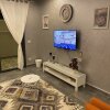 Отель Lovely 2-bed Apartment in Kafr Nassar, фото 14