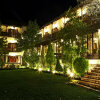 Отель Country Club Hotel & Suites в Карпениси