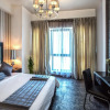 Отель Loumage Hotel & Suites, фото 4