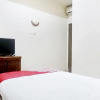Отель Wisma Tirta Kencana by Oyo Rooms, фото 6