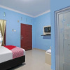 Отель OYO 90752 Ridho Guest House Syariah, фото 18