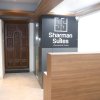 Отель Sharman Suites, фото 2