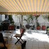 Отель Roof-top garden apartment really well located in Athens, фото 9