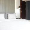 Отель Modern & Cozy 2Br Apartment At Tamansari Tera Residence, фото 12