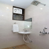 Отель OYO 11593 Hotel Aman Guest House, фото 8