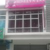 Отель OYO 90090 Roselyn Inn 2 в Пасире Гуданге