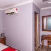 Отель Rk Cahaya by OYO Rooms в Лабуане
