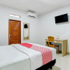 Отель OYO 90671 Petanu Residence, фото 4