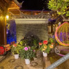 Отель Memory Garden Memory Garden Yinxiang Ancient City Panoramic Beauty Su (Lijiang Ancient City Store), фото 22