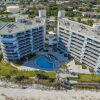 Отель Luxurious Contemporary Corner Condo Overlooking Pool Beach Wrap Around Balcony Ebb Tide 401, фото 19