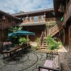 Отель Blossom Hill Inn Lijiang Lotusland, фото 3
