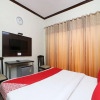 Отель OYO 23414 Jauhari Guest House, фото 11