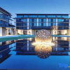 Отель Zhoushan Zhujiajian Greentown Zhen Ru Bay Lanting Homestay, фото 1