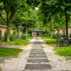Отель Practical chalet with terrace, in a green holiday park near Amsterdam, фото 26