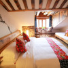 Отель ZhangJiaJie GuoKe Inn, фото 5