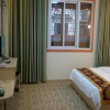 Отель Chizhou Xiaocunzhilian Business Hotel, фото 4