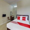 Отель OYO 91933 Puri Gana Residence, фото 6