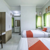 Отель Wisma Teratai by OYO Rooms, фото 7