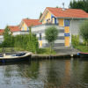 Отель Detached holiday home with combi-microwave at the Schildmeer, фото 5