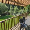 Отель Cosy Chalet With Large Garden and Playground, Located at the Edge of the Forest, фото 4