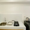 Отель Modern Furnished And Homey Studio Tokyo Riverside Pik 2 Apartment, фото 6