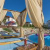 Отель Holiday House With Private Pool for 6-8 Persons in the Holiday Park Jelovci, фото 9