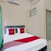 Отель Oyo 91572 Kost Esklusif Barokah, фото 4