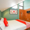 Отель OYO 316 Umada Beds & Lounge Syariah, фото 5
