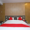 Отель OYO 27605 Moments Inn, фото 6