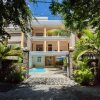 Отель Le Palmiste Resort & Spa на пляже Тру-о-Биш